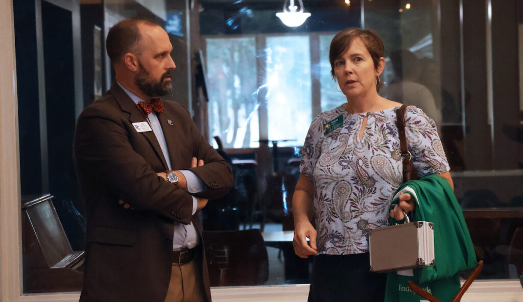 The Rev. Dr. Buz Wilcoxon (right) talks to an attendee at the regional NetVUE conference hosted by Presbyterian College.