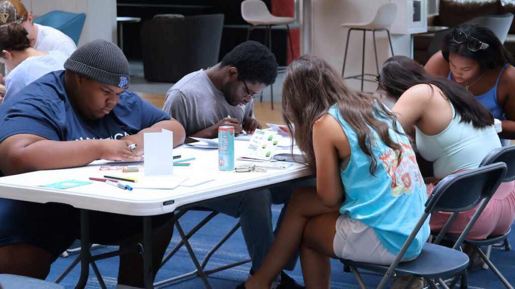 PC students making cards for Thornwell parents during fall Service Day.